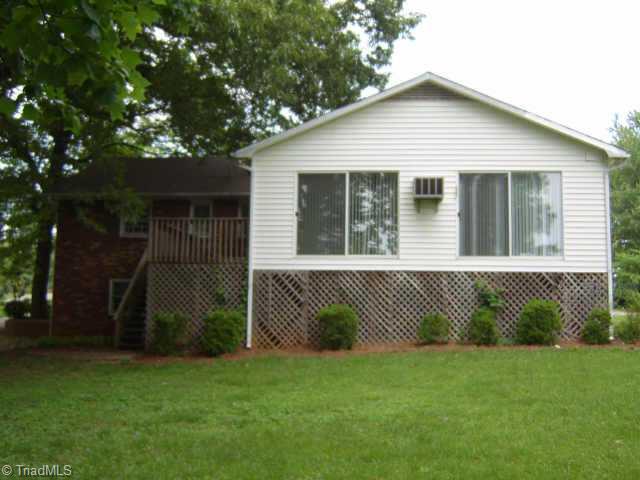 750 Lacock Avenue Rural Hall, NC 27045 - Photo 2 of 6 Other. Wonderful sunroom/den on the back of the house.