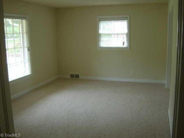 750 Lacock Avenue Rural Hall, NC 27045 - Photo 5 of 6 Other. Bright and sunny living room.