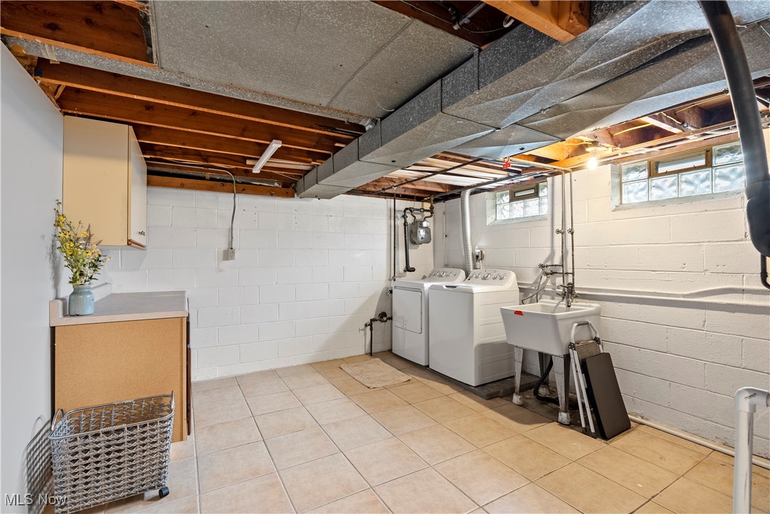 5962 Edgewood Road Cleveland, OH 44124 - Photo 21 of 27 spacious utility area with storage cabinet