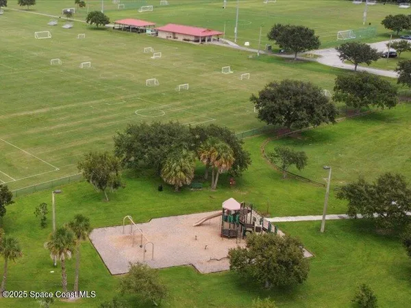 a view of a golf course with a garden