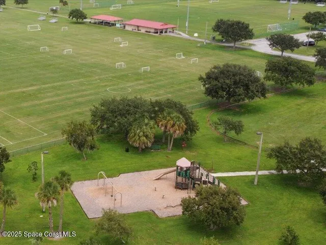 a view of a golf course with a garden