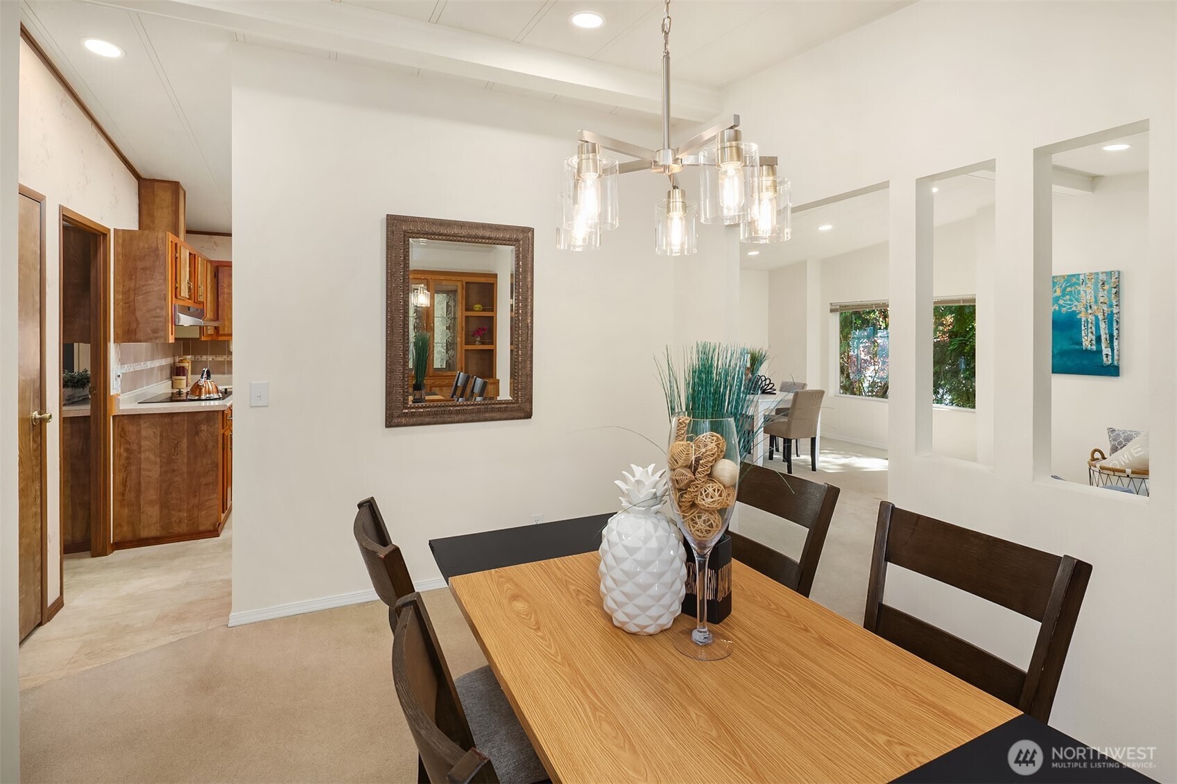 23632 9th Place West Bothell, WA 98021 - Photo 14 of 39 a view of a dining room with furniture window and wooden floor