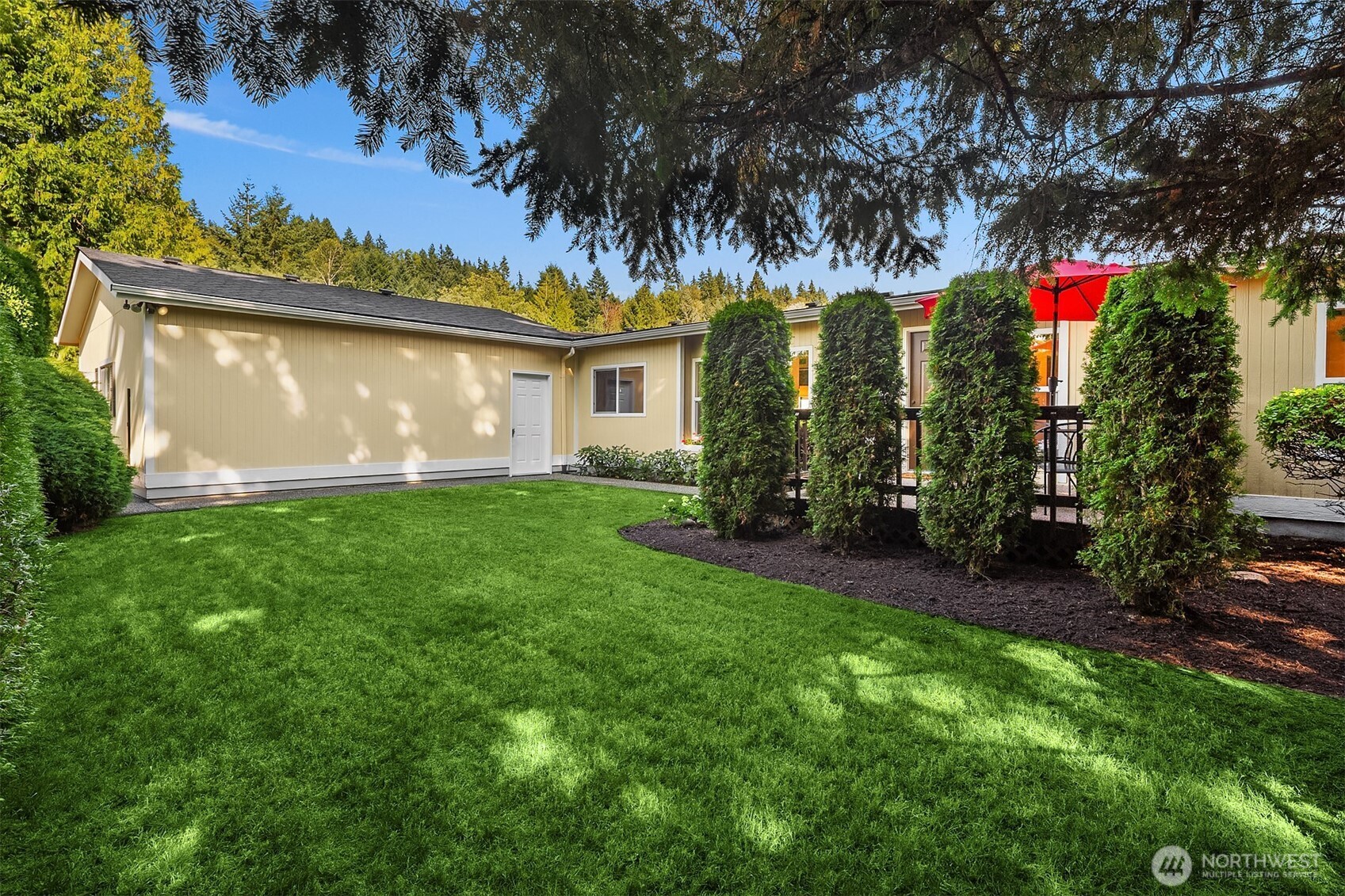 23632 9th Place West Bothell, WA 98021 - Photo 29 of 39 a front view of a house with garden