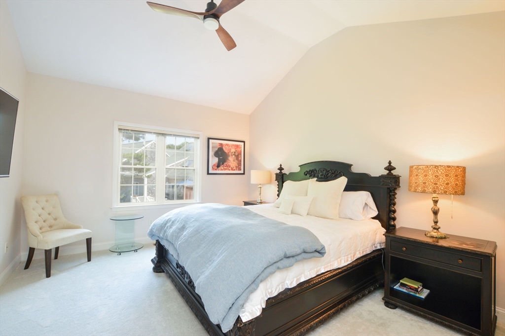 17 Stratford Ridge, Unit 17 Mashpee, MA 02649 - Photo 14 of 24 a bedroom with a bed and window