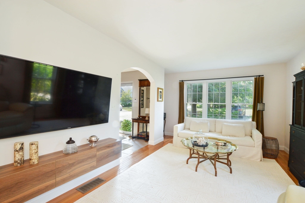 17 Stratford Ridge, Unit 17 Mashpee, MA 02649 - Photo 20 of 24 a living room with furniture and a flat screen tv