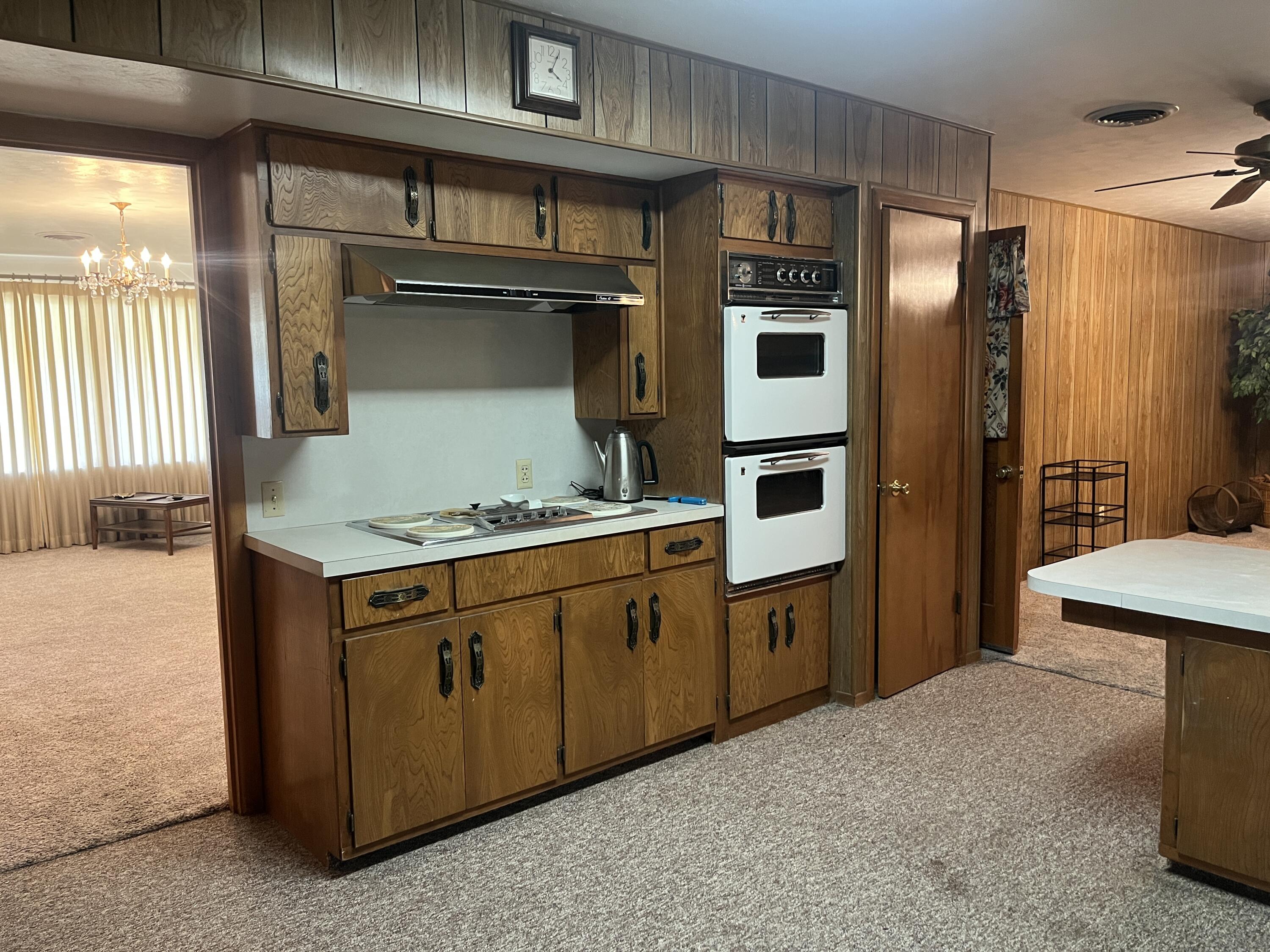 404 North 21st Street Lamesa, TX 79331 - Photo 11 of 30 a kitchen with stainless steel appliances granite countertop a refrigerator and a sink