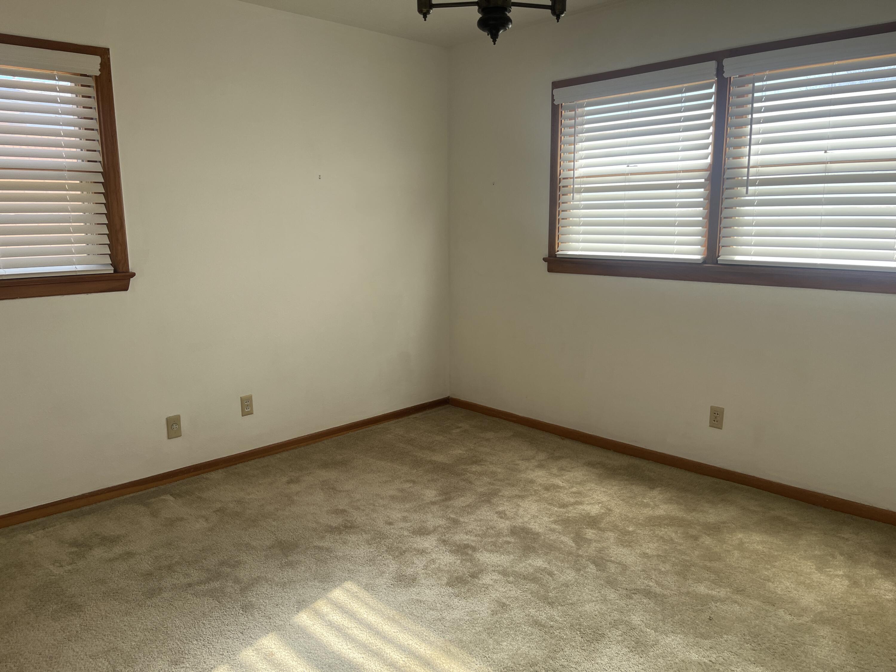 404 North 21st Street Lamesa, TX 79331 - Photo 15 of 29 an empty room with a window