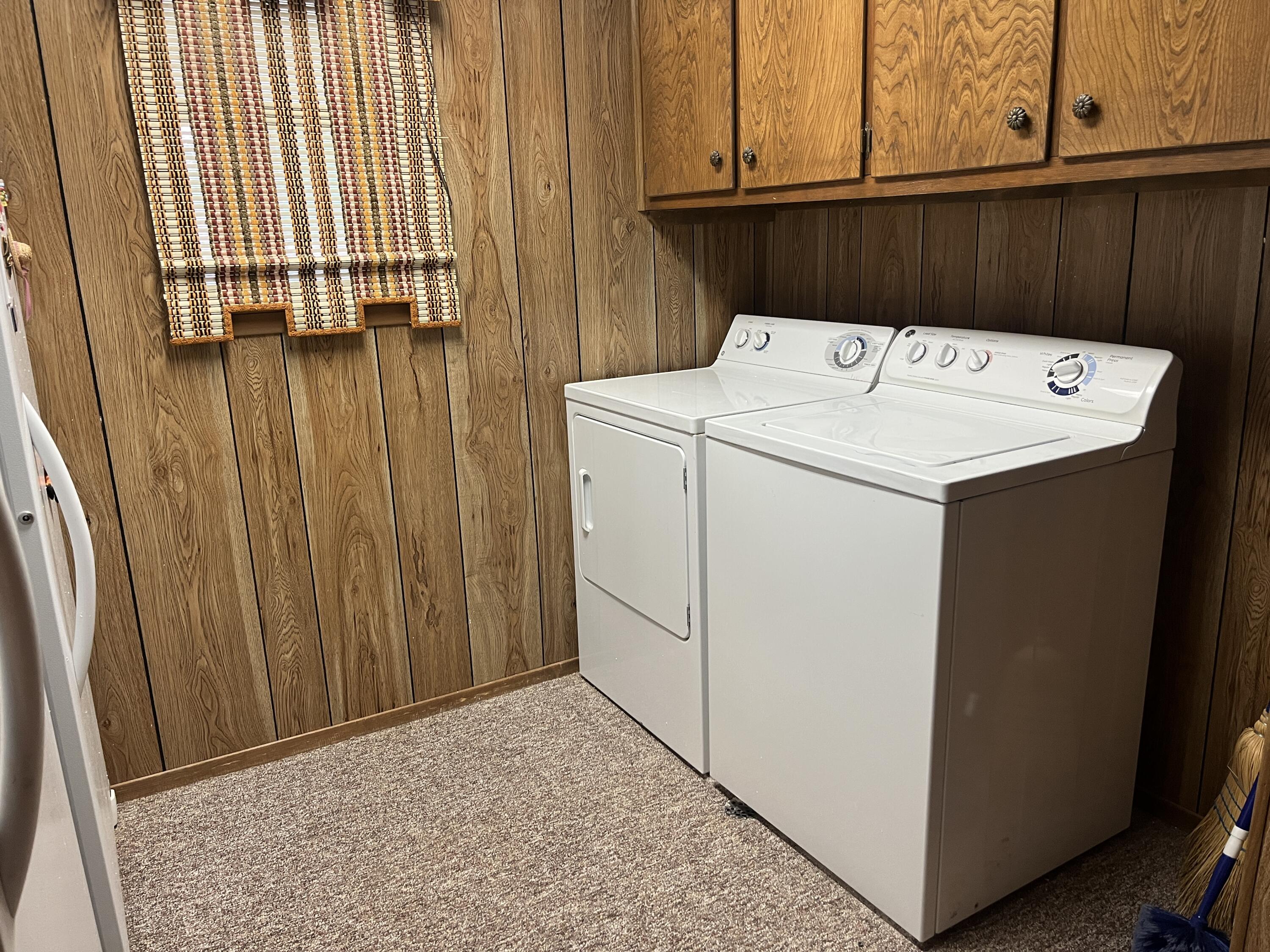 404 North 21st Street Lamesa, TX 79331 - Photo 22 of 29 a utility room with dryer and washer