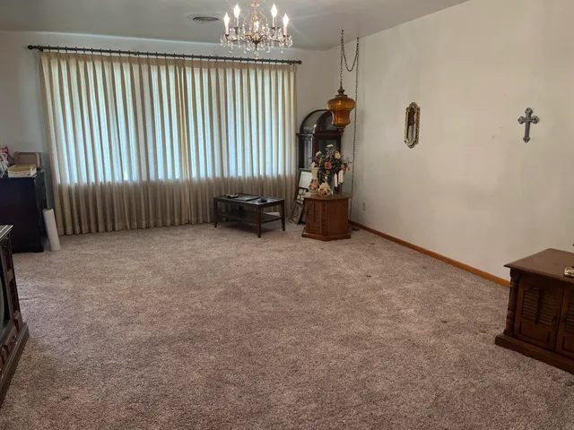 a bathroom with a bathtub and a window