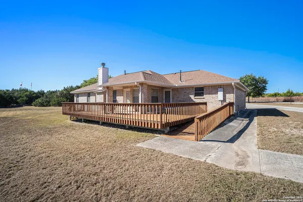 a view of a house with a roof deck