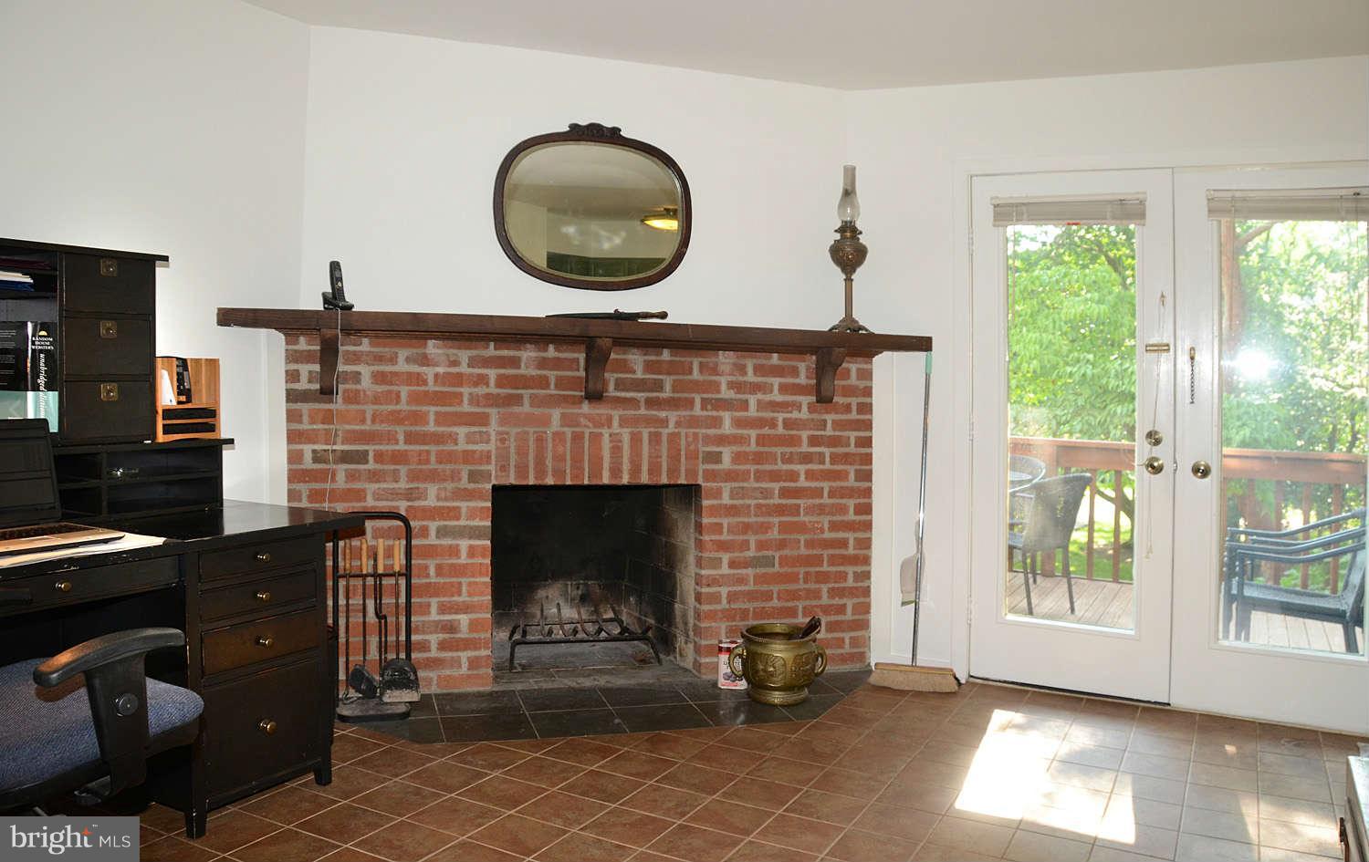 1625 Apricot Court Reston, VA 20190 - Photo 13 of 30 Adjoins Kitchen Wood Burning FP