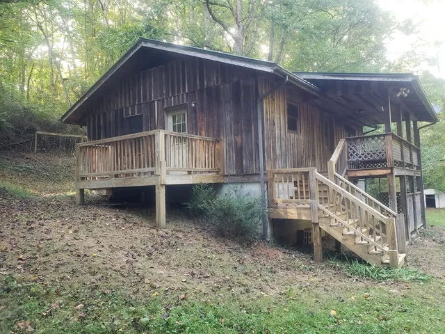 a house with trees in the background