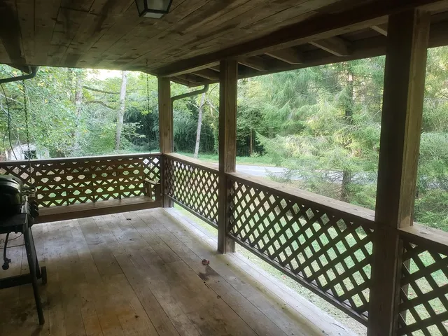 a view of a lake from a balcony