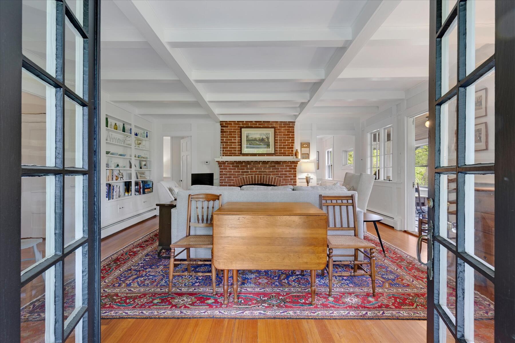 21 Quaker Road East Sandwich, MA 02537 - Photo 9 of 43 a living room with furniture and a rug