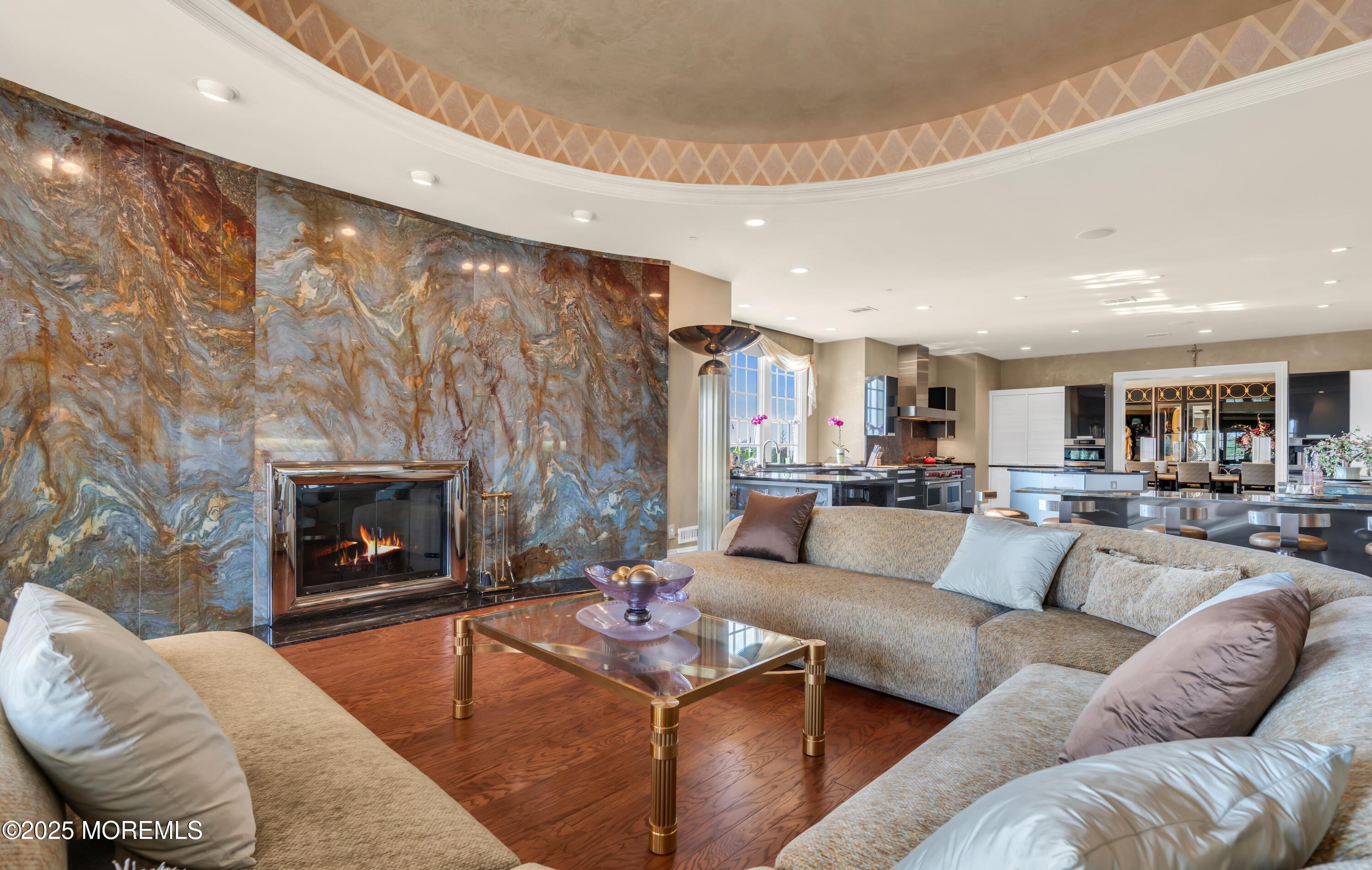 1041 Oval Road Manasquan, NJ 08736 - Photo 11 of 30 a living room with furniture and a fireplace