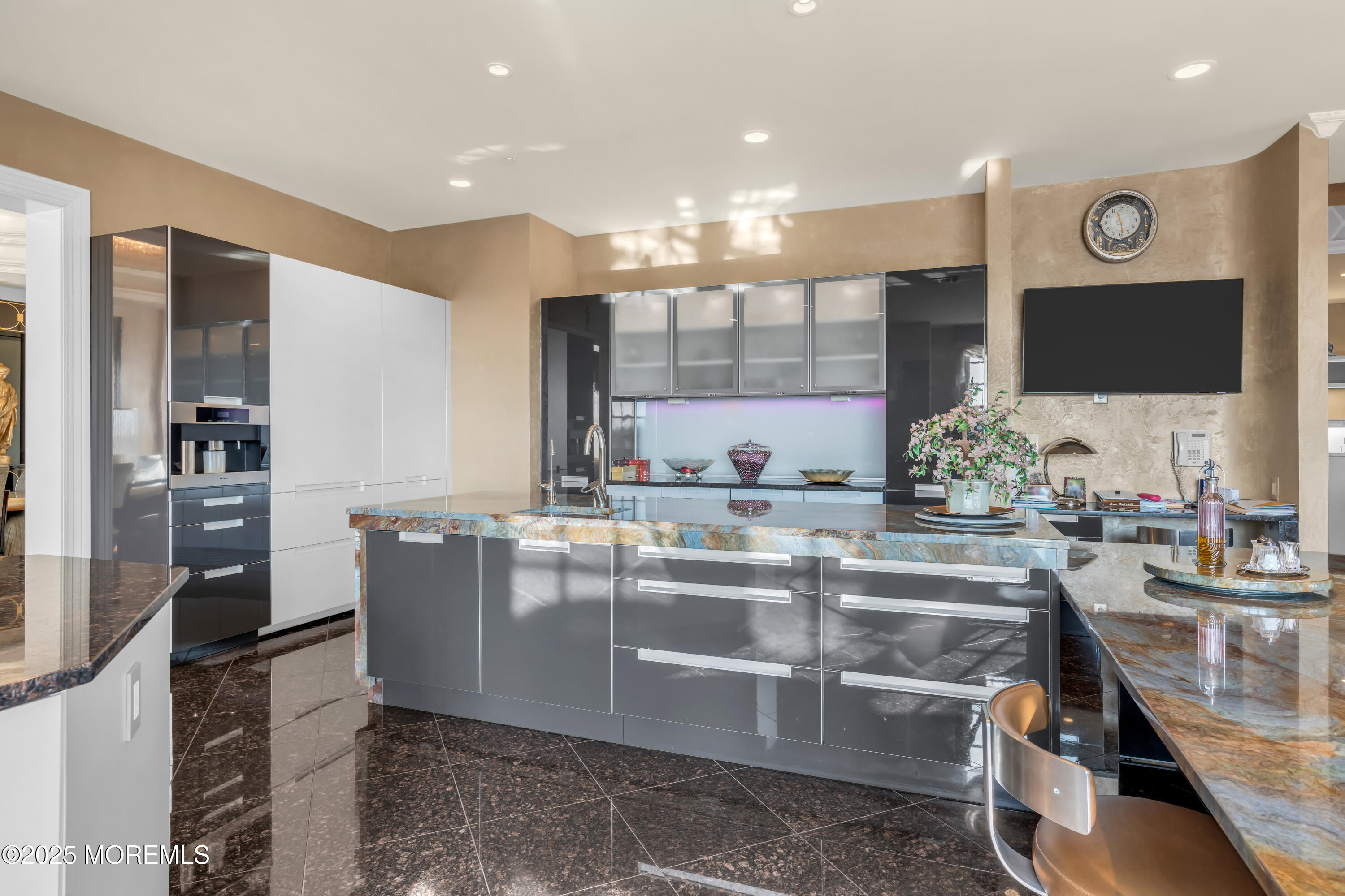 1041 Oval Road Manasquan, NJ 08736 - Photo 15 of 30 a kitchen with granite countertop a stove and cabinets