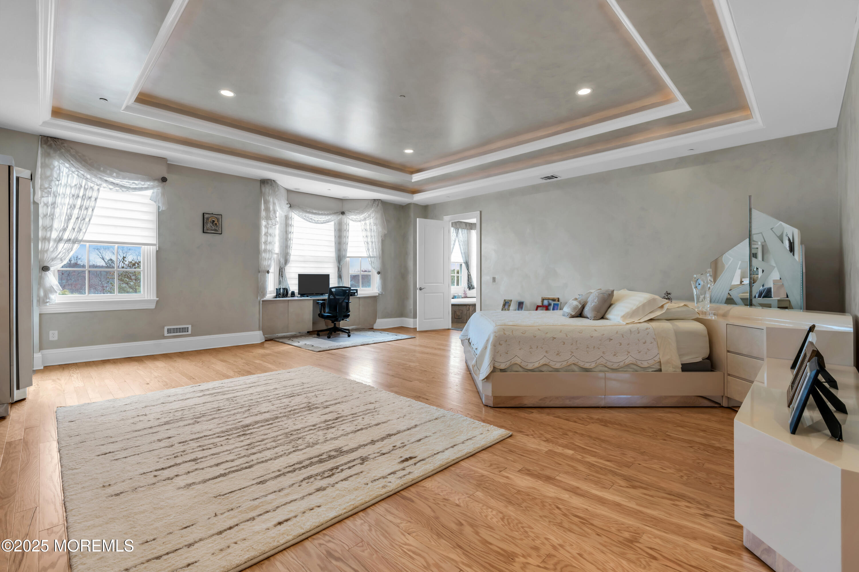 1041 Oval Road Manasquan, NJ 08736 - Photo 20 of 30 a bedroom with a large bed and a window