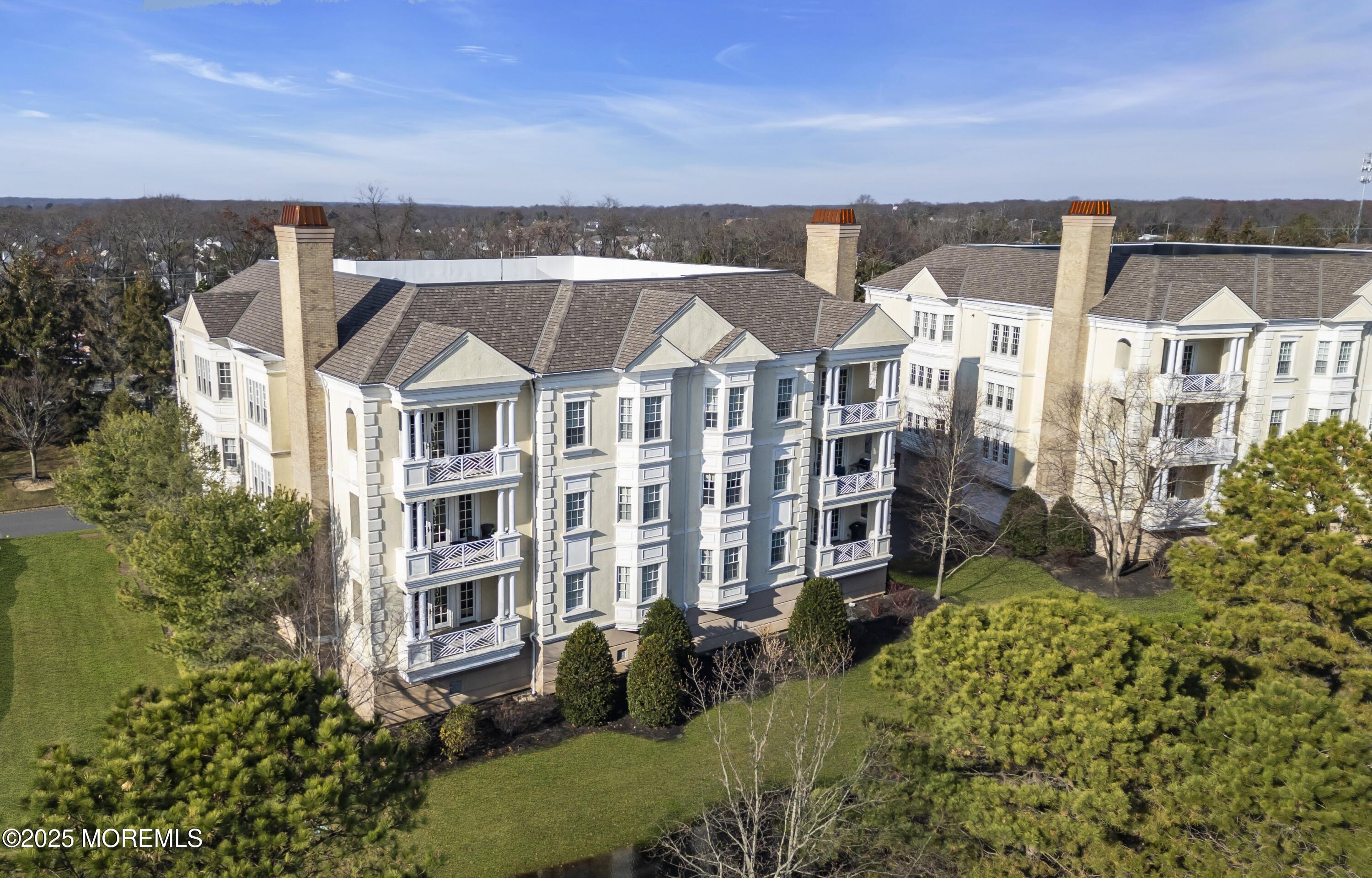 1041 Oval Road Manasquan, NJ 08736 - Photo 2 of 30 an aerial view of residential houses with yard