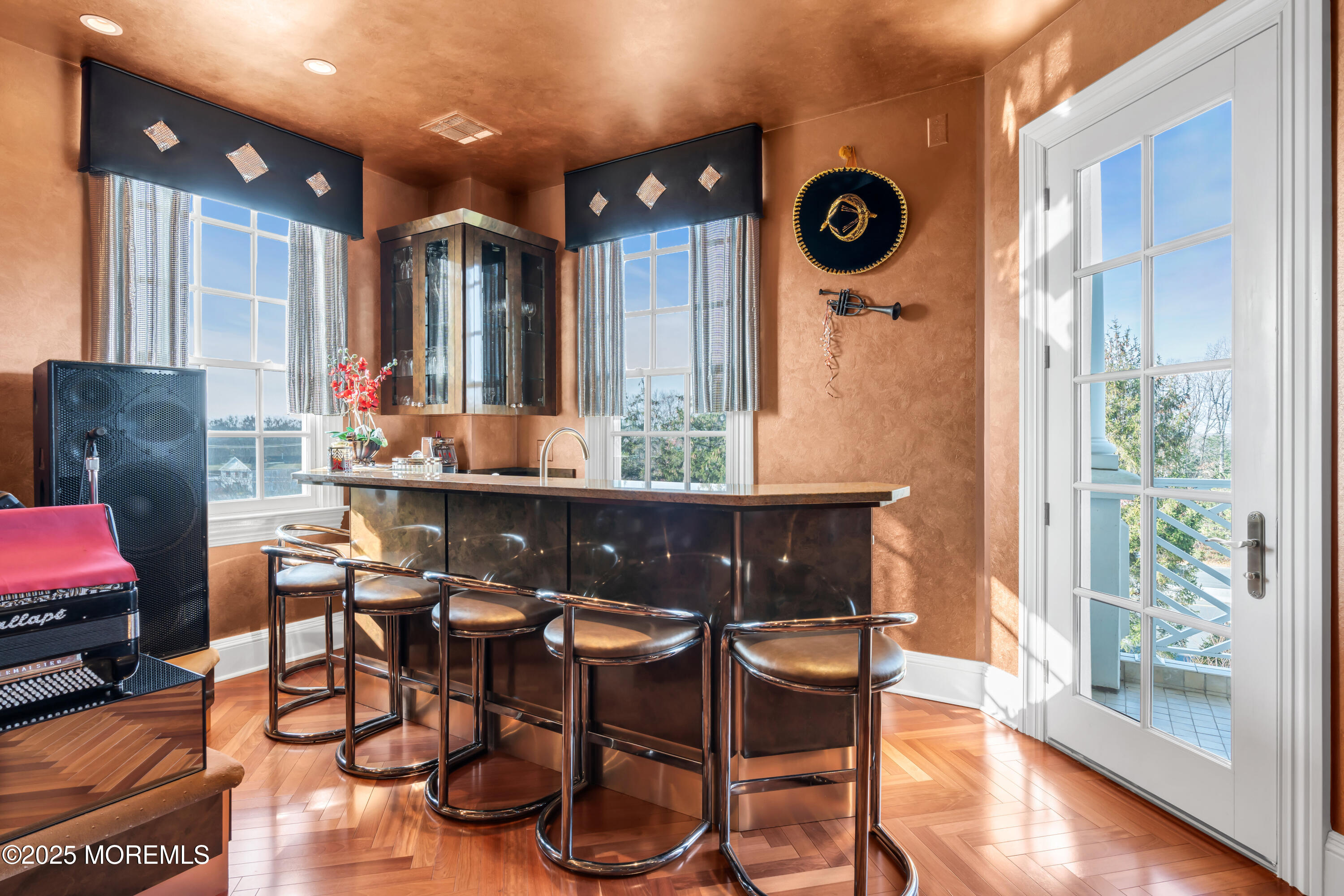 1041 Oval Road Manasquan, NJ 08736 - Photo 27 of 30 a view of a dining room with furniture window and wooden floor