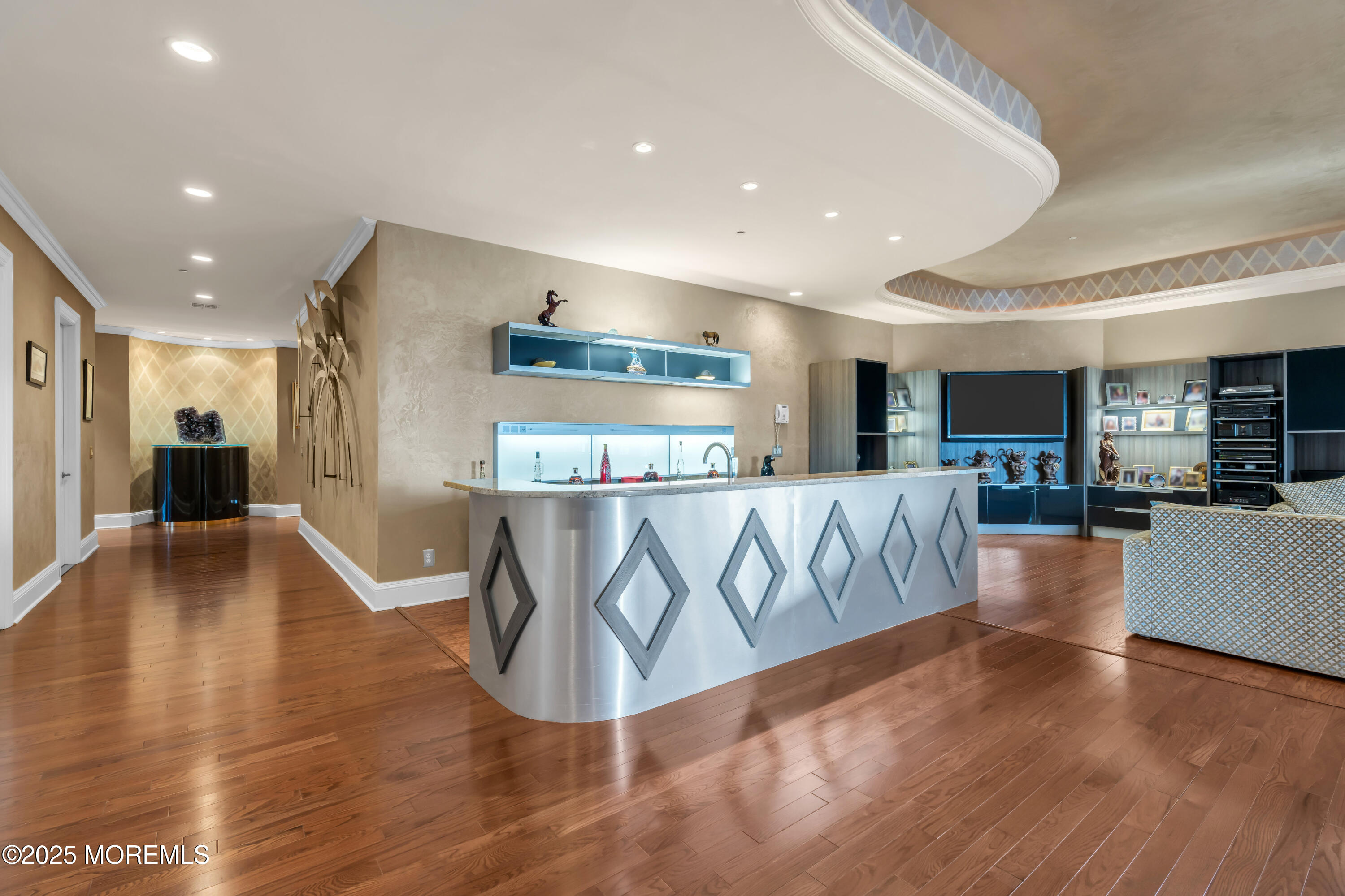 1041 Oval Road Manasquan, NJ 08736 - Photo 5 of 30 a view of a living room and kitchen with furniture