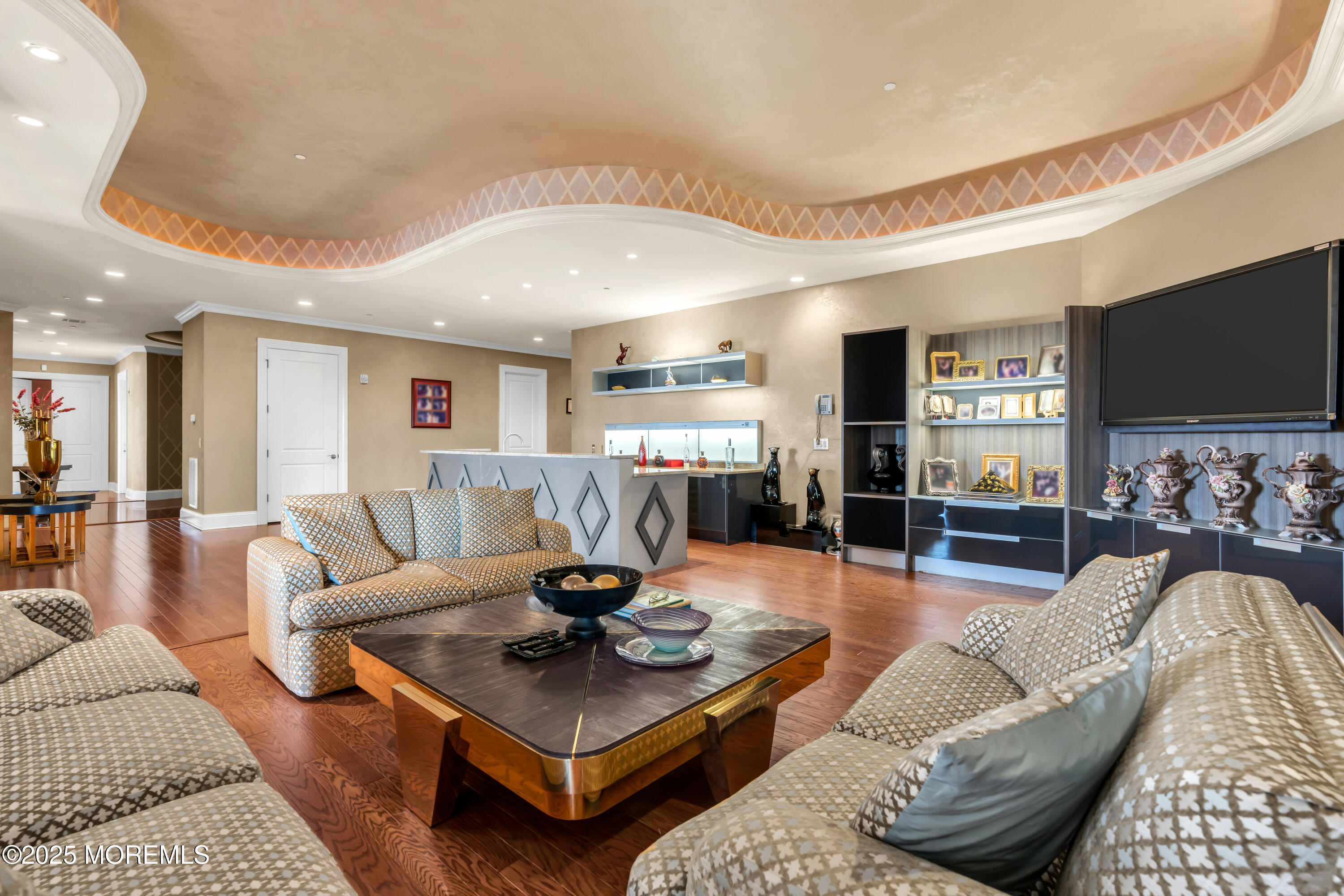 1041 Oval Road Manasquan, NJ 08736 - Photo 8 of 30 a living room with furniture and a flat screen tv