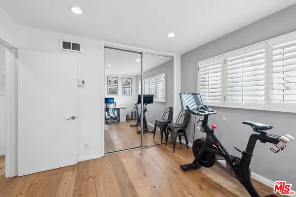 a view of a living room and dining room