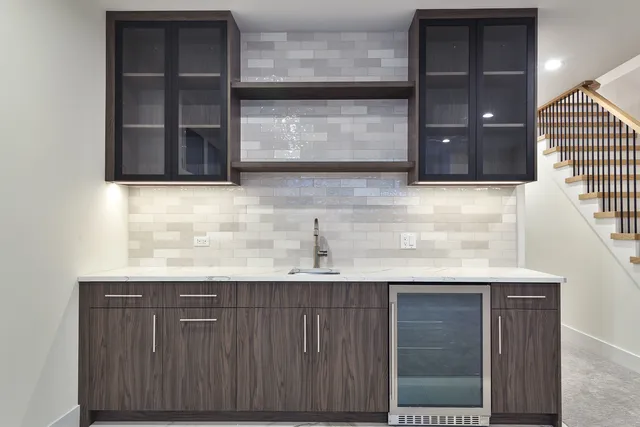 a view of a brick house with a large gate