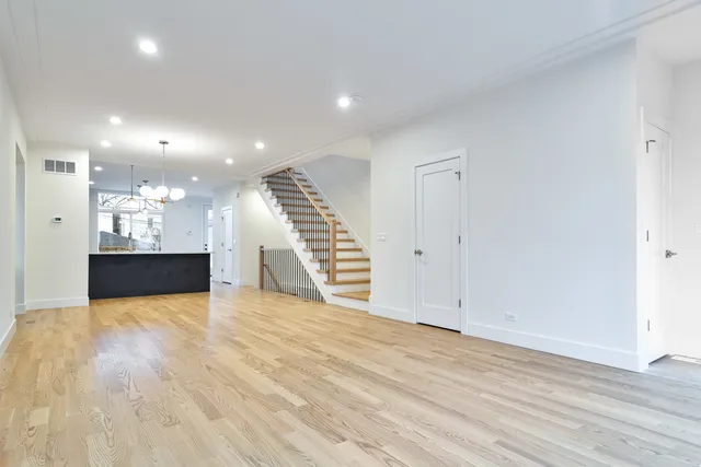 a close view of sink a vanity and a mirror