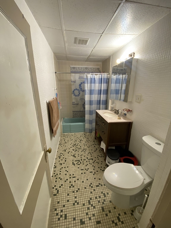 9 Fifth Avenue Worcester, MA 01607 - Photo 12 of 41 a bathroom with a sink toilet and shower