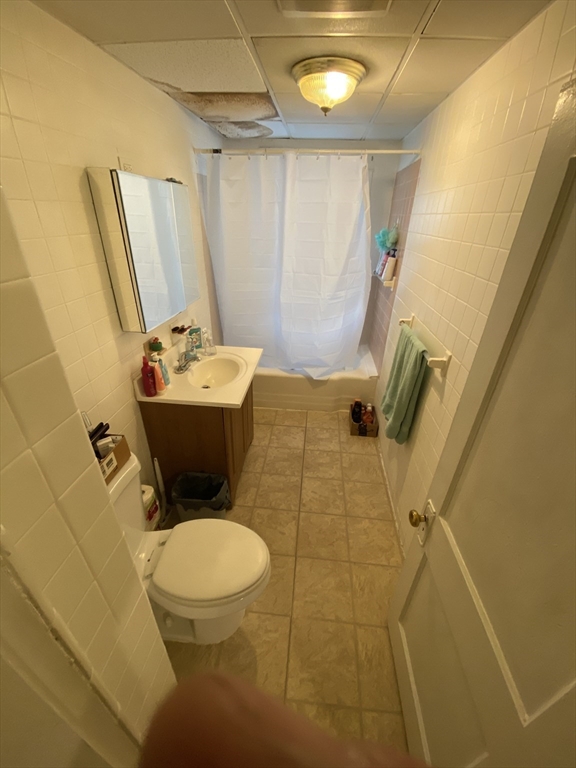 9 Fifth Avenue Worcester, MA 01607 - Photo 17 of 41 a bathroom with a sink and toilet