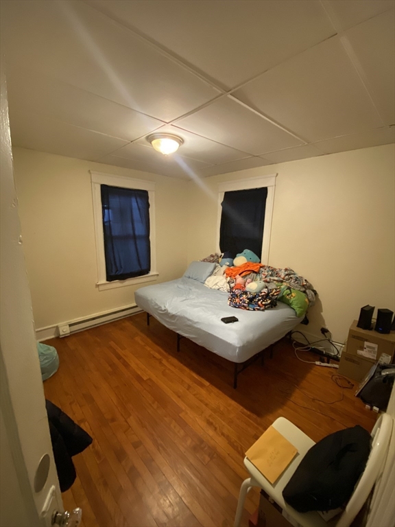 9 Fifth Avenue Worcester, MA 01607 - Photo 18 of 41 a living room with furniture and a flat screen tv