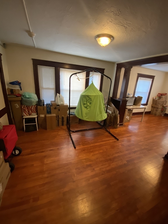9 Fifth Avenue Worcester, MA 01607 - Photo 21 of 41 a living room with furniture pool table and a window