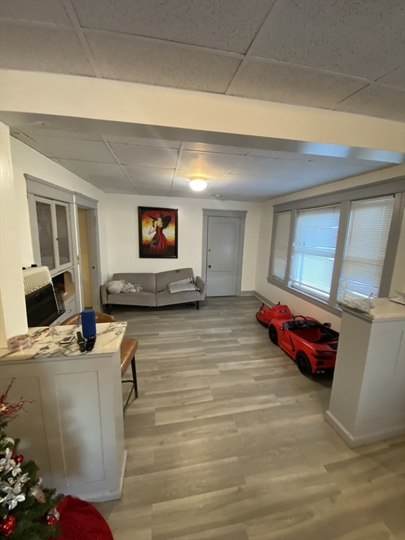 9 Fifth Avenue Worcester, MA 01607 - Photo 39 of 41 a living room with furniture and a flat screen tv