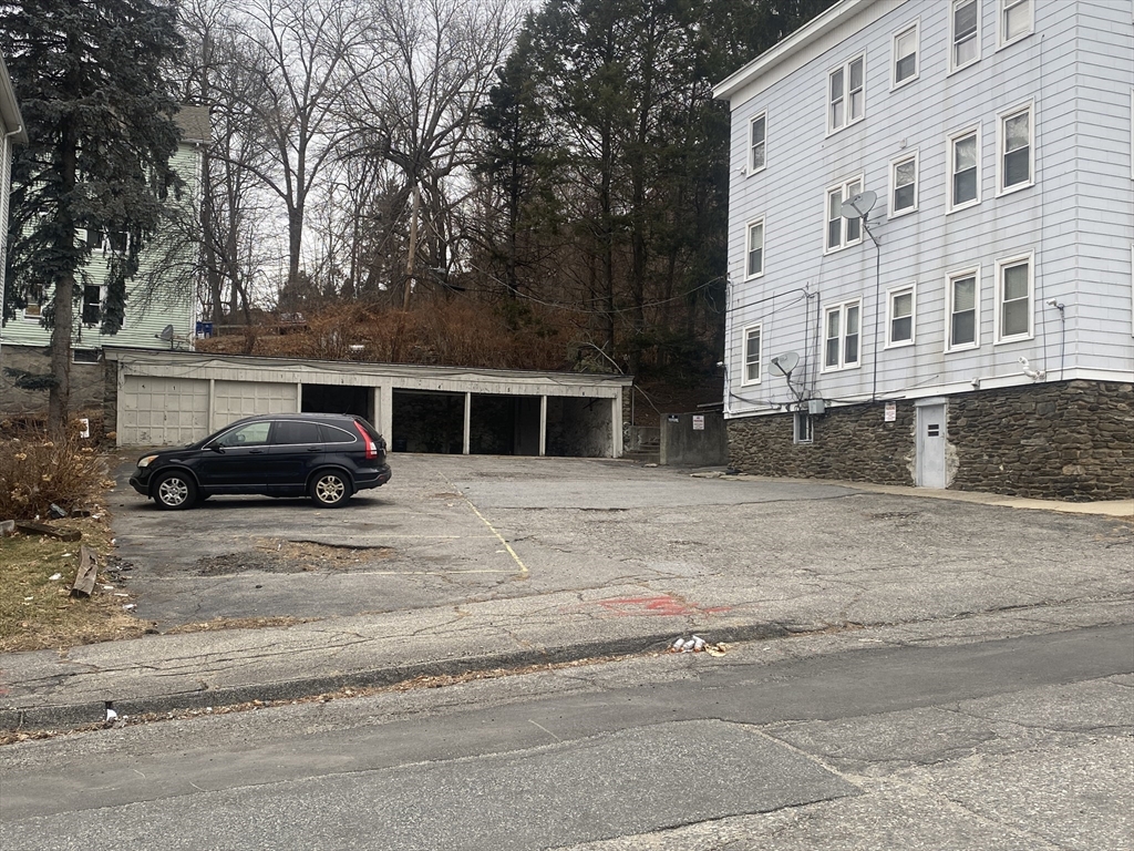 9 Fifth Avenue Worcester, MA 01607 - Photo 41 of 41 a car parked in front of a building