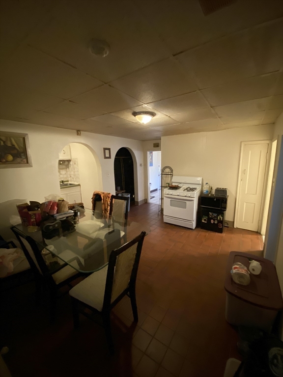 9 Fifth Avenue Worcester, MA 01607 - Photo 7 of 41 a living room with furniture and a piano