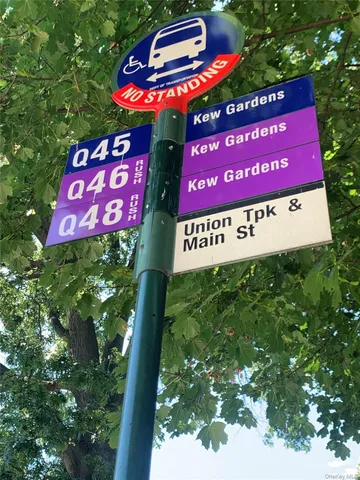 a sign that is on a brick wall