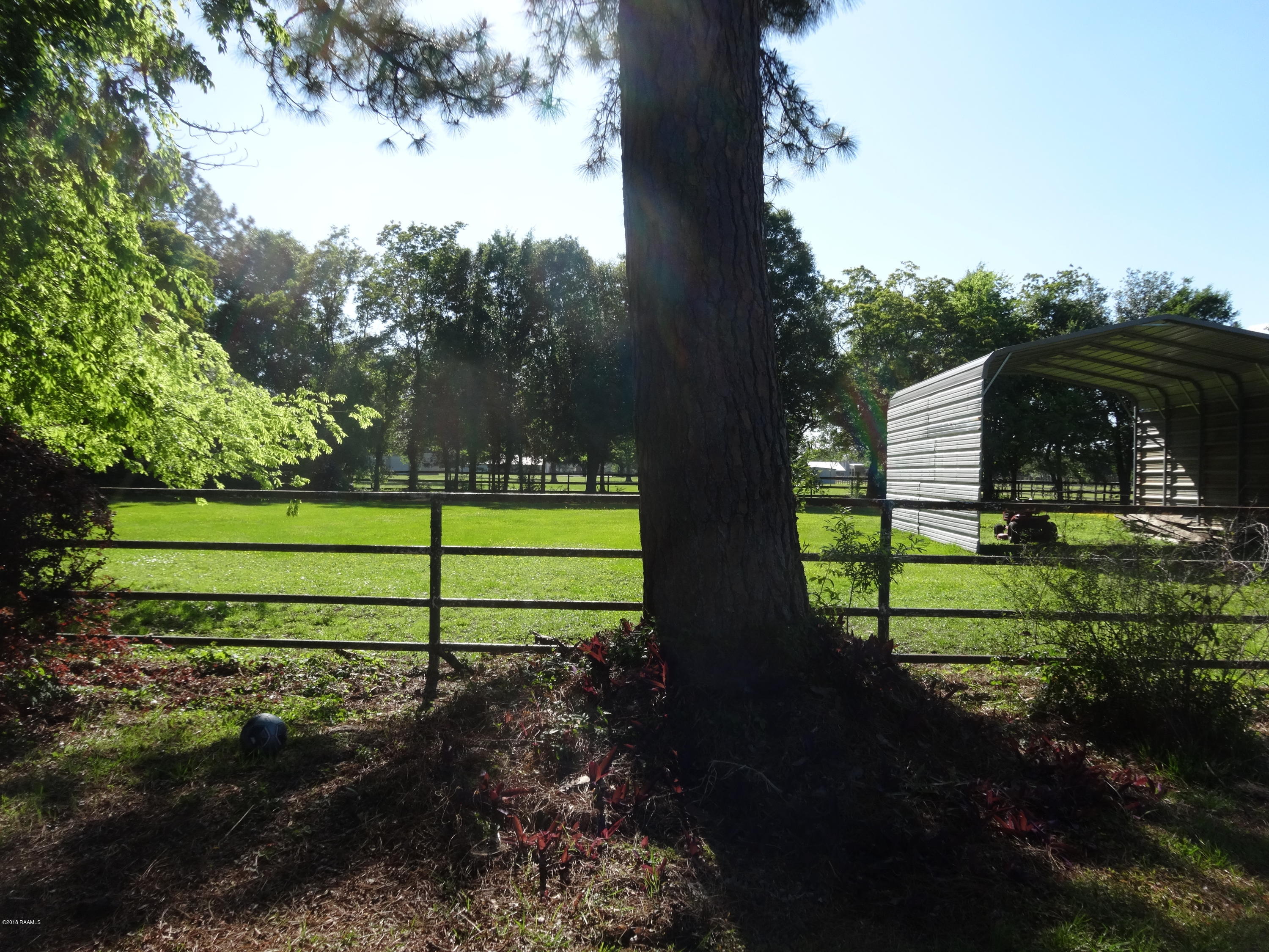 177 Atlas Road Youngsville, LA 70592 - Photo 27 of 33 Rear View with RV/Camper structure