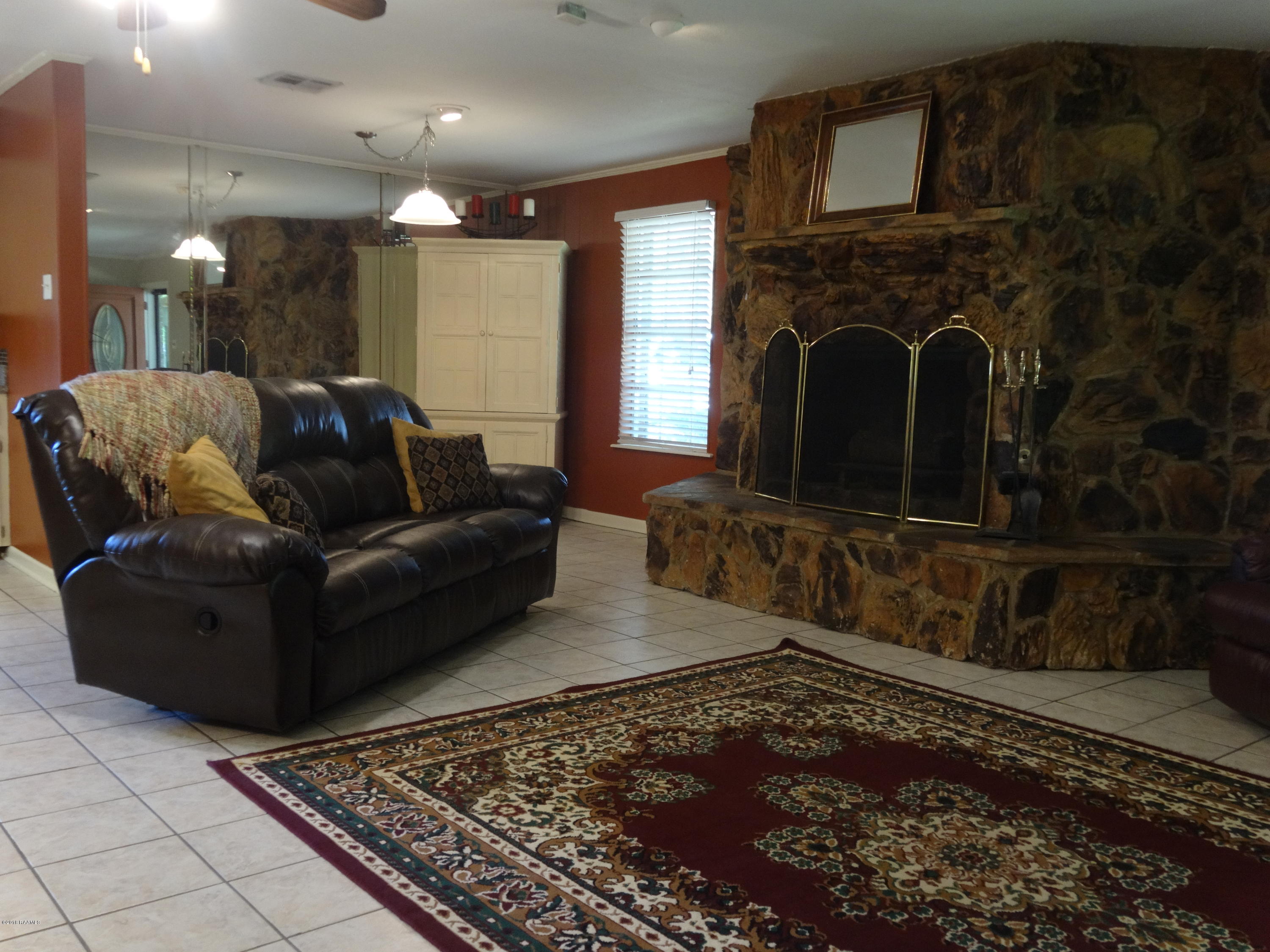 177 Atlas Road Youngsville, LA 70592 - Photo 3 of 33 Living Room/Den