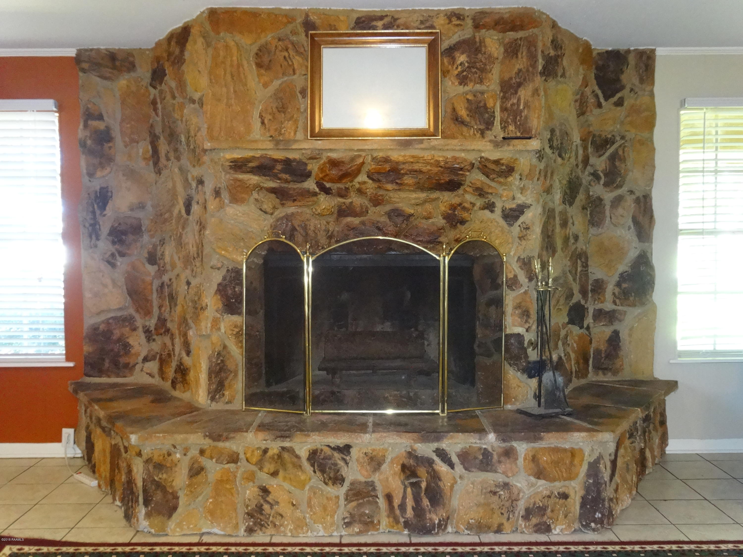 177 Atlas Road Youngsville, LA 70592 - Photo 5 of 33 Stone Fireplace