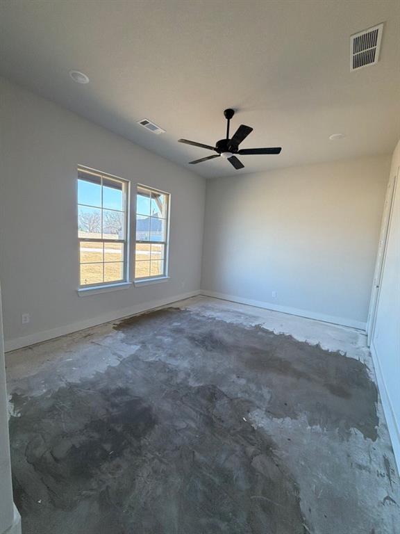 905 Perrin Lane Van Alstyne, TX 75495 - Photo 4 of 8 a view of a livingroom with a ceiling fan and window