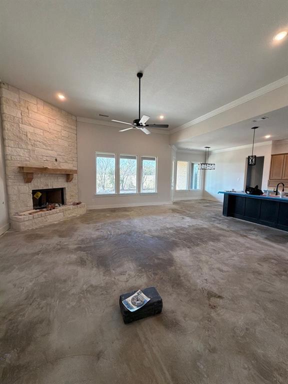 905 Perrin Lane Van Alstyne, TX 75495 - Photo 5 of 8 a living room with furniture and a fireplace