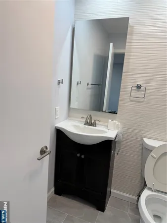 a bathroom with a sink and a toilet