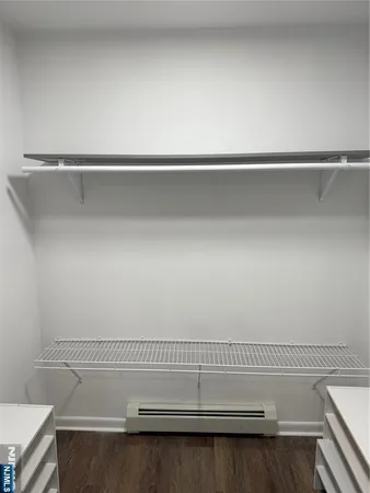 a view of small space with racks on the wall