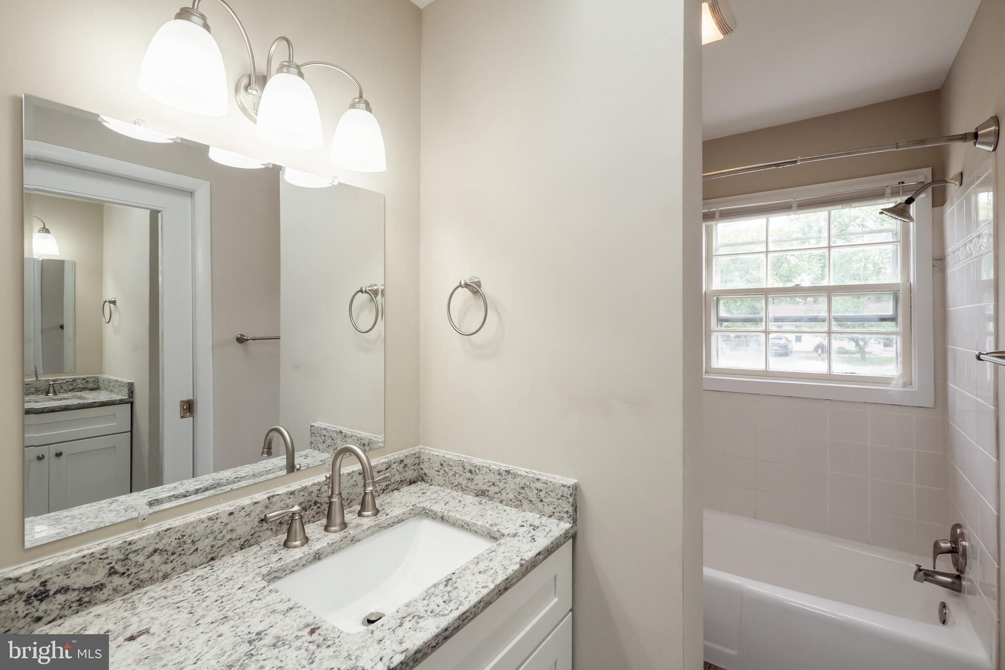7802 Hayfield Road Alexandria, VA 22315 - Photo 14 of 34 Renovated Master Bathroom