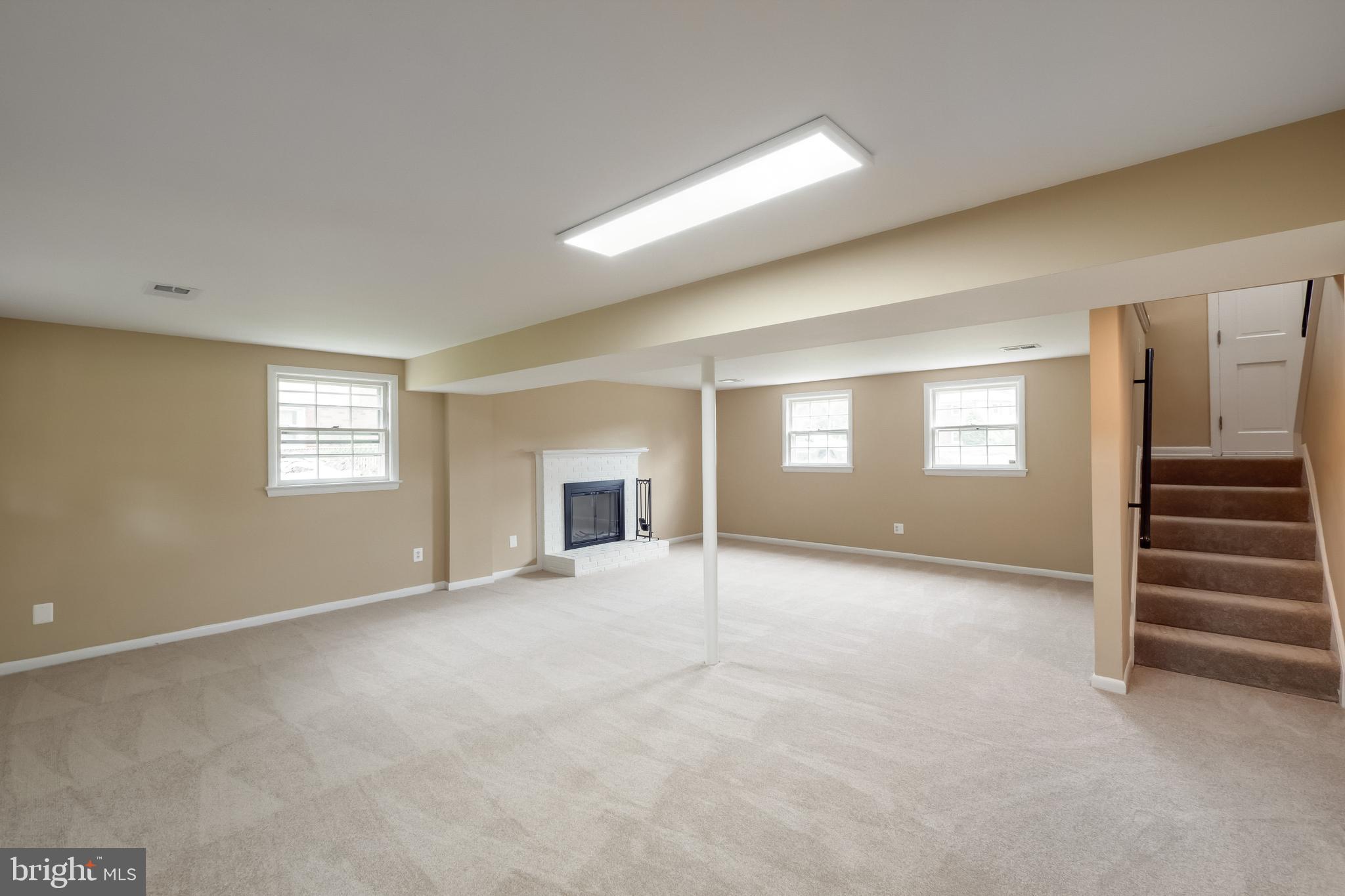 7802 Hayfield Road Alexandria, VA 22315 - Photo 22 of 34 Huge Rec Room- New carpet