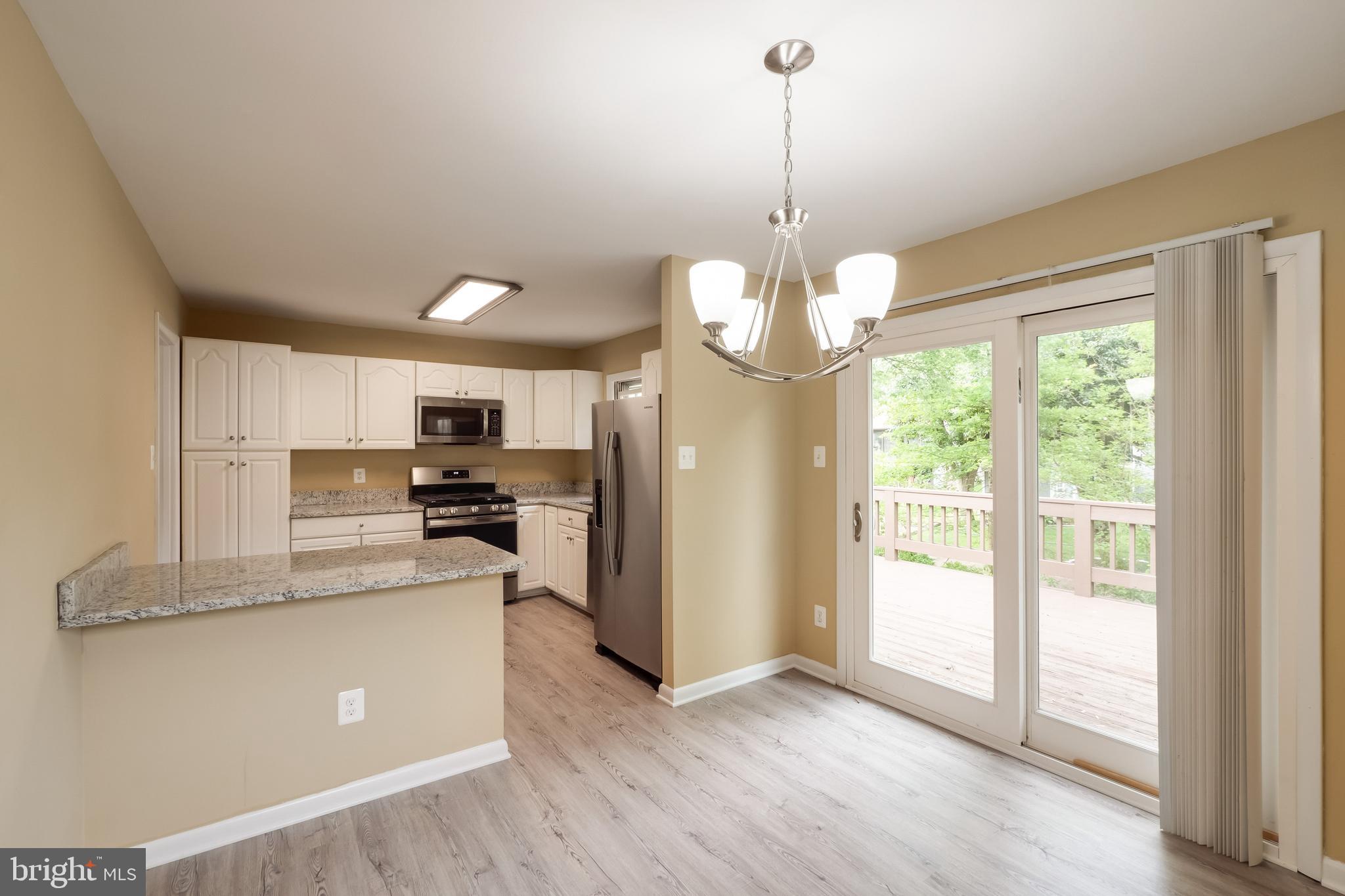 7802 Hayfield Road Alexandria, VA 22315 - Photo 10 of 34 Din Rm w/ Walkout to Deck
