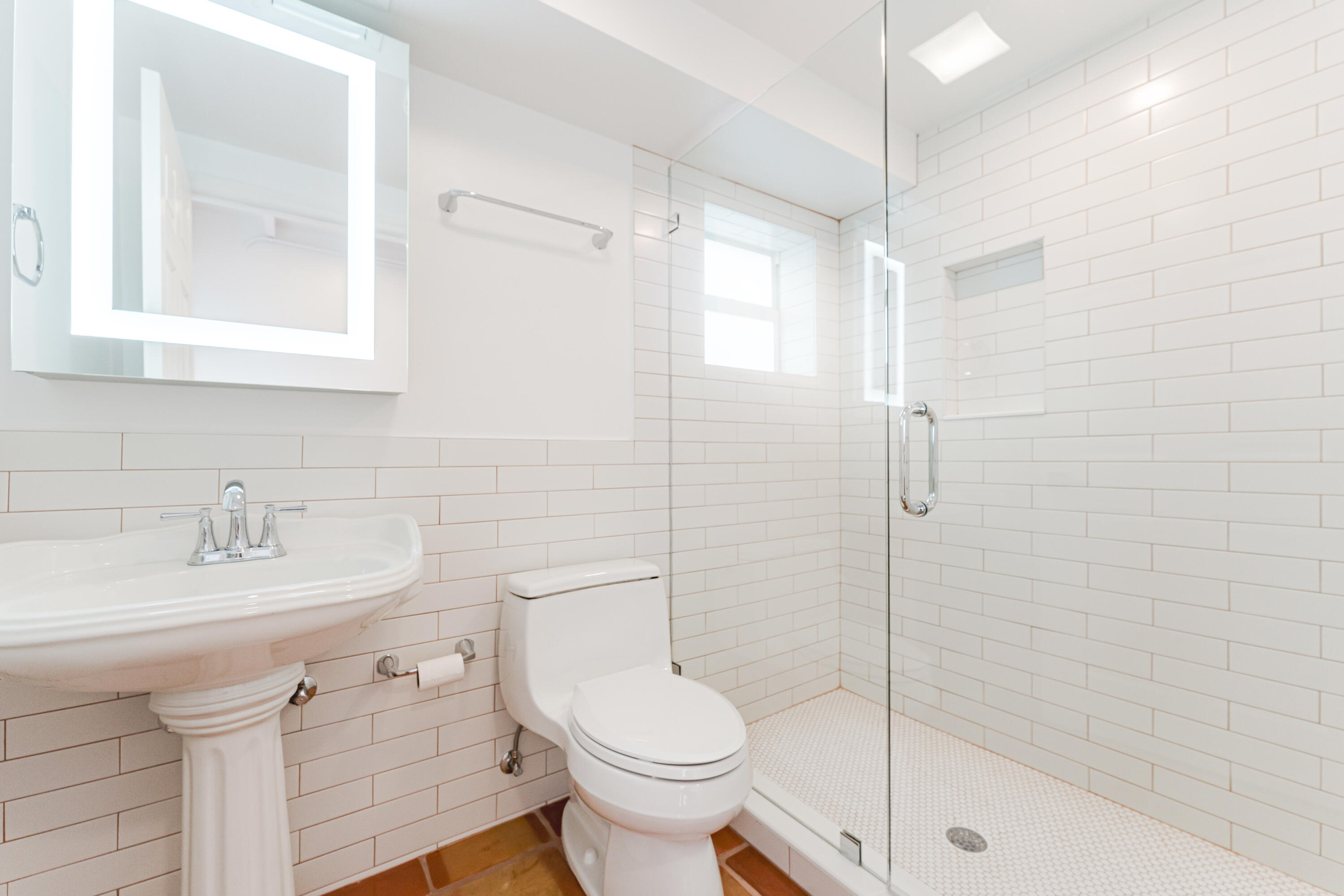 921 Ortega Road West Palm Beach, FL 33405 - Photo 35 of 60 a bathroom with a sink toilet and shower