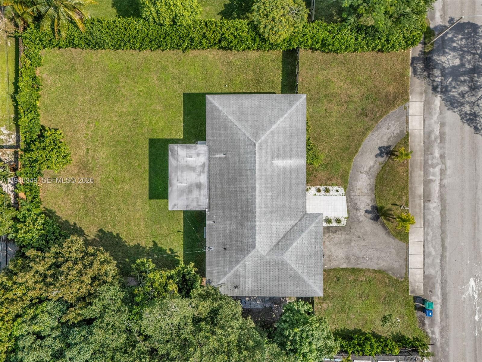 195 Northwest 115th Street Miami, FL 33168 - Photo 22 of 27 an aerial view of residential house with outdoor space