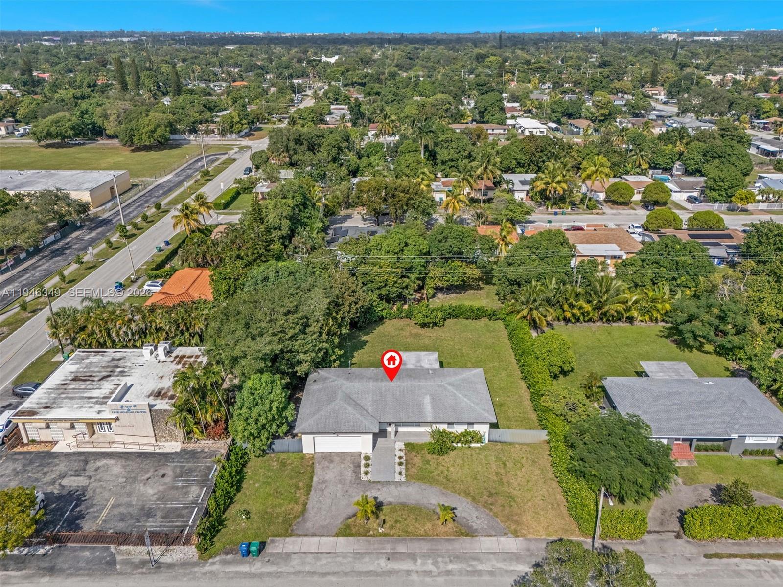 195 Northwest 115th Street Miami, FL 33168 - Photo 26 of 27 an aerial view of residential houses and outdoor space
