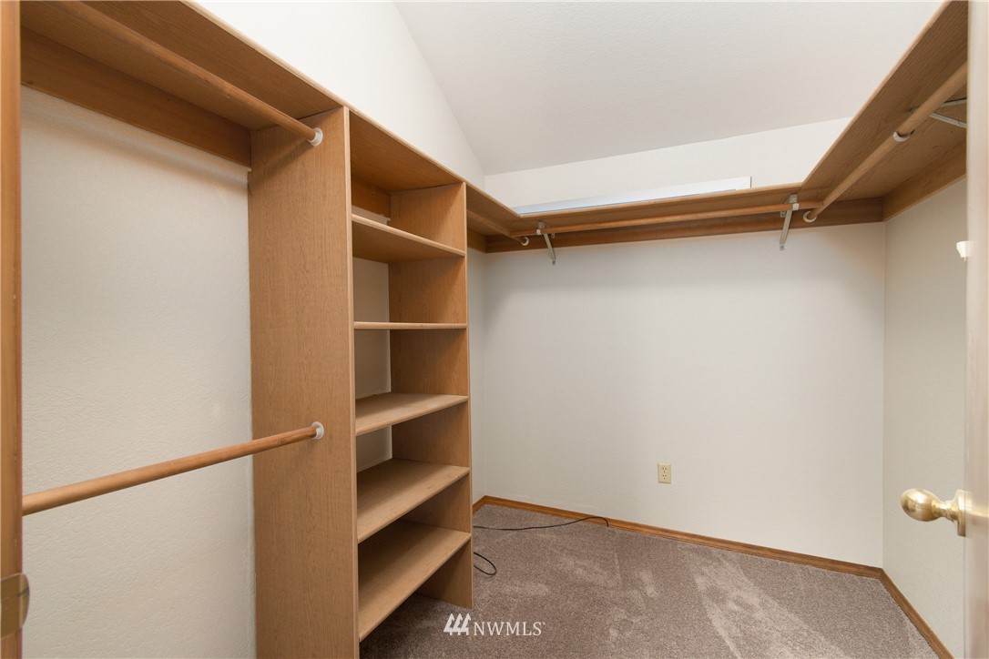 1320 Coal Creek Road Longview, WA 98632 - Photo 22 of 34 a view of walk in closet with empty racks